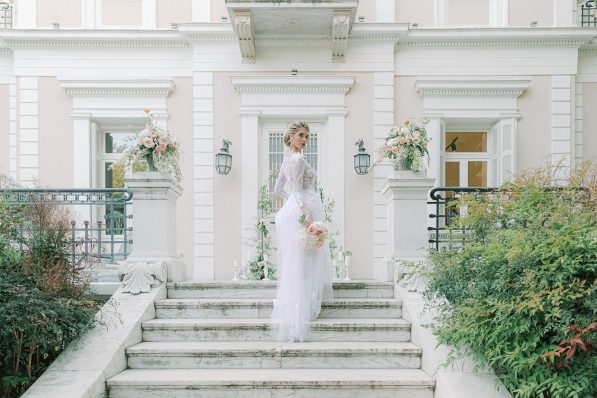 Wedding dresses for Greece, bride wearing dress on stone steps