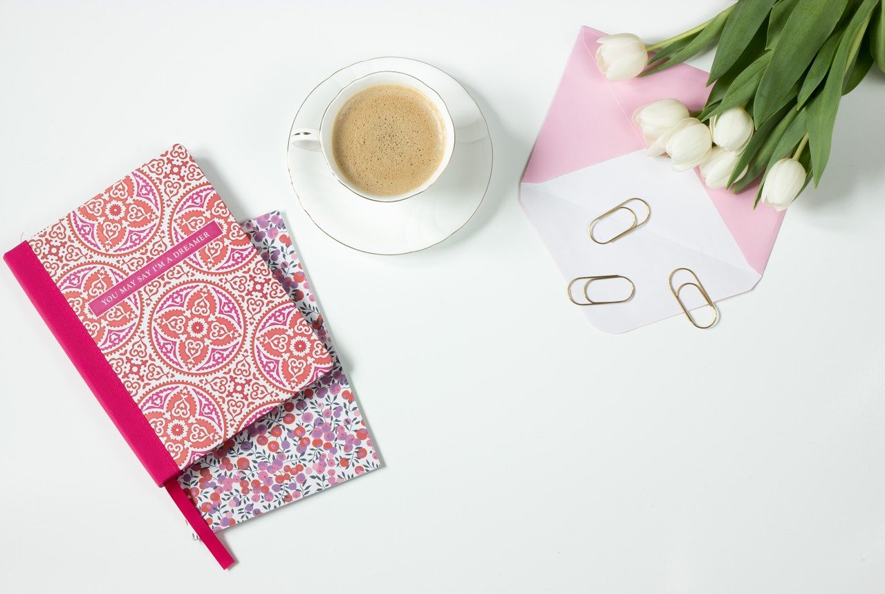 wedding planning details notebook flowers and coffee