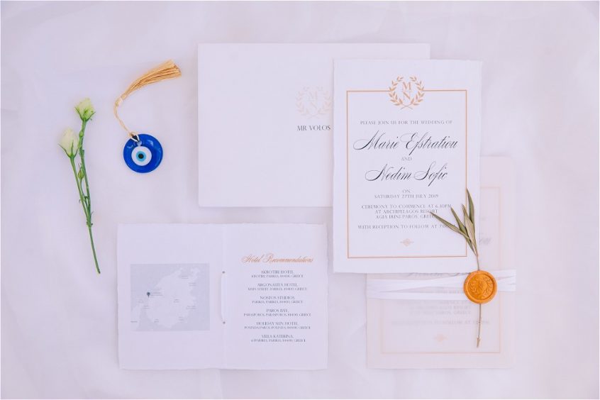 White wedding stationery with favours