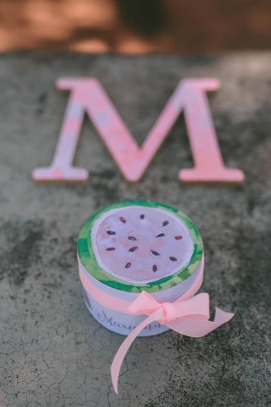 Watermelon box baptism christening bomboniere favors with custom name and peach ribbon for a baptism ceremony.
