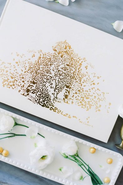 White and gold foiled leopard Cartier minimal and chic wish book.