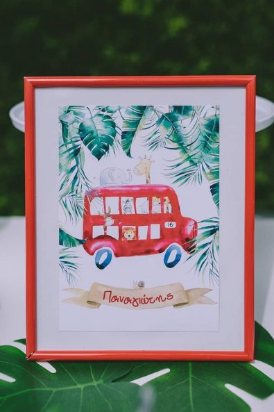 Name poster with a red bus and banana leaves illustration for a boy's baptism.