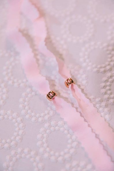Minimal and chic christening pins for a baby girl's baptism.]