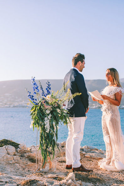 Bride and groom exchanging vows at their elopement in Paros