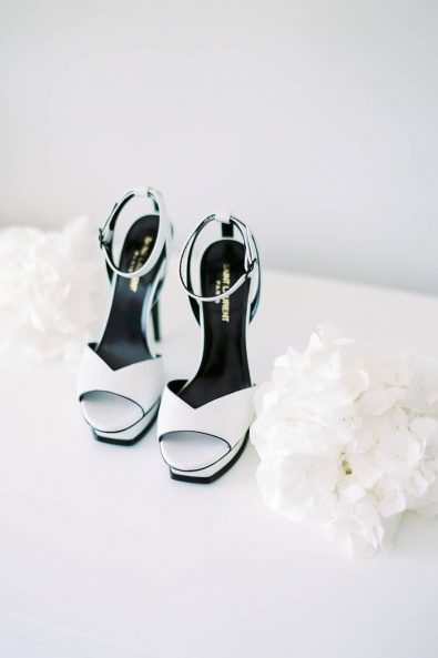 Saint Laurent Paris white wedding high heels sandals and crisp white hydrangeas.