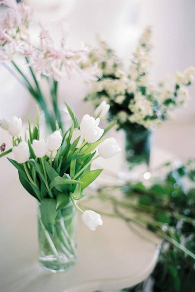 Summer wedding flower arrangement with white tulips.