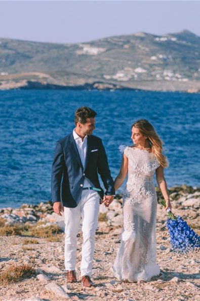 bride and groom holding hands