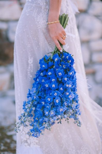 closeup of bride holding flowers