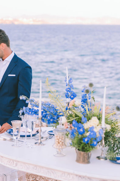 Bride and groom next to their wedding table at their elopement