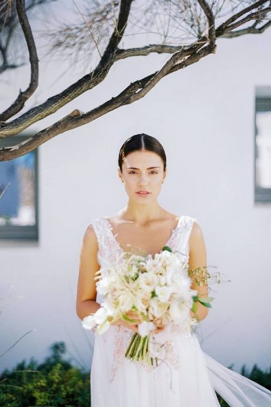 A minimal and romantic bridal portrait on a summer island.