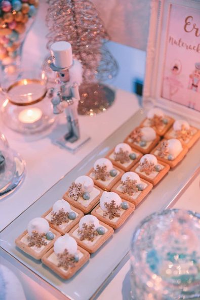 Mini square vanilla french tarts with snowflake decoration for a Nutcracker ballet event and baptism ideas.