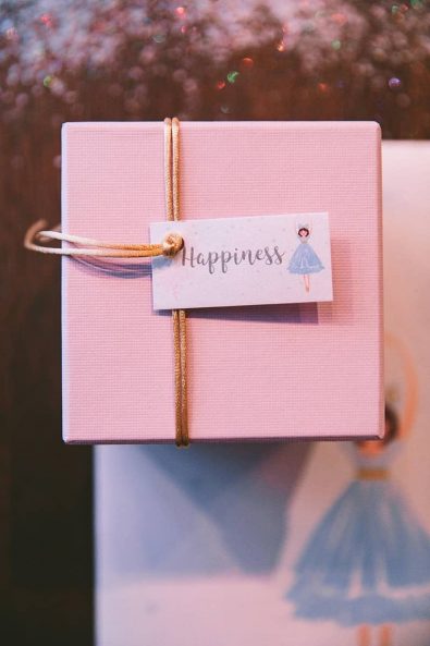 Handmade christening baptism favors baptism ideas Bomboniere in a light pink box with golden string and wish tag.
