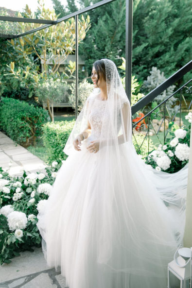 Bride wearing her veil and dress