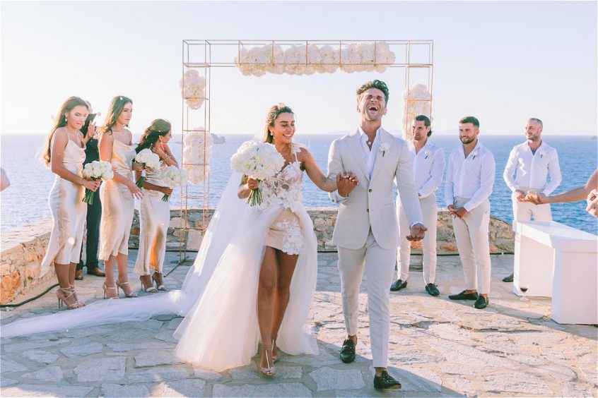 Bride and Groom walking hand in hand