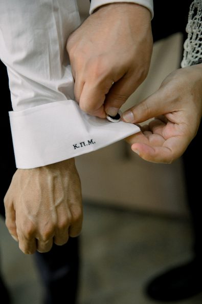 Groom wedding button on sleeve for minimal and chic wedding