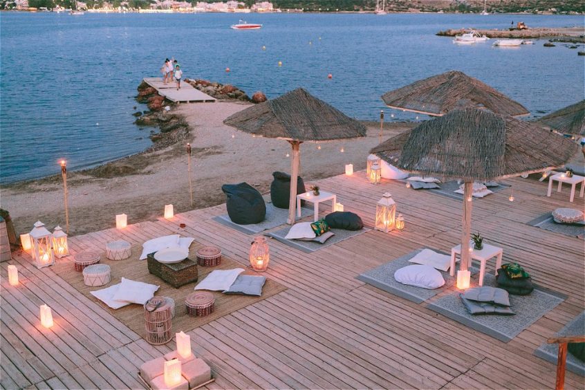 picnic next to sea at wooden dock