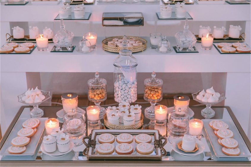 Beautifully decorated candy bar by wedding designer