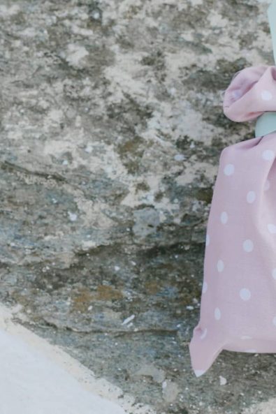 Christening favors with pink polka dot fabric and mint colored ribbon.
