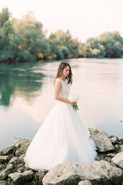 A romantic lakeside destination summer wedding in Greece.