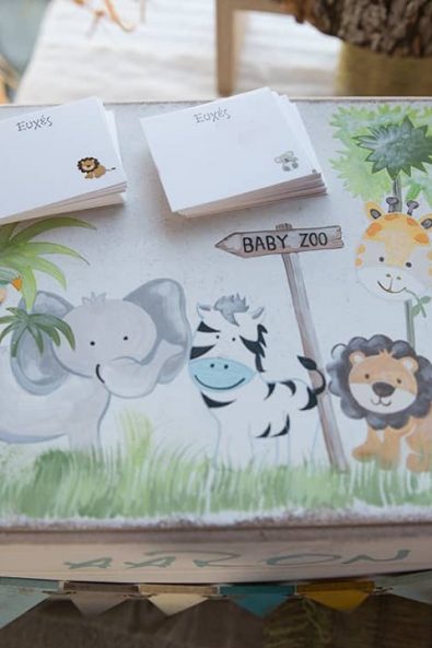 Baby zoo inspired wooden box for wishes with jungle animals.