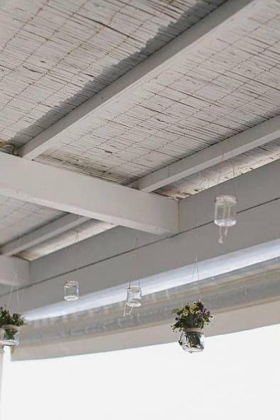 Hanging flower decoration vases for a wedding party.