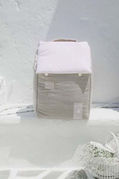 Light pink and brown house shaped soft bag for baby girl's clothes and toys.