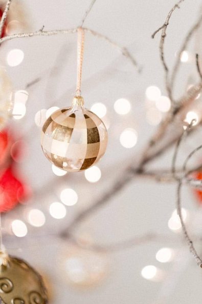 Gold and bronze chess patterned tree bauble.