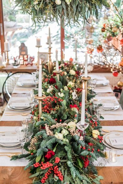 Festive red and green table setting for a fancy Christmas dinner party.