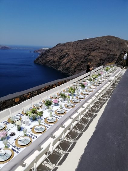 Art Catering dinnerware setup and sea view