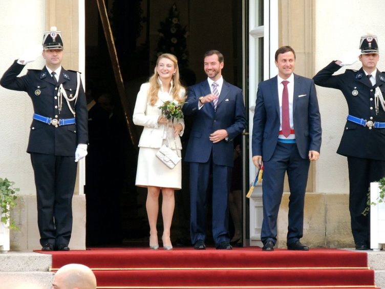 just married couple exiting town hall