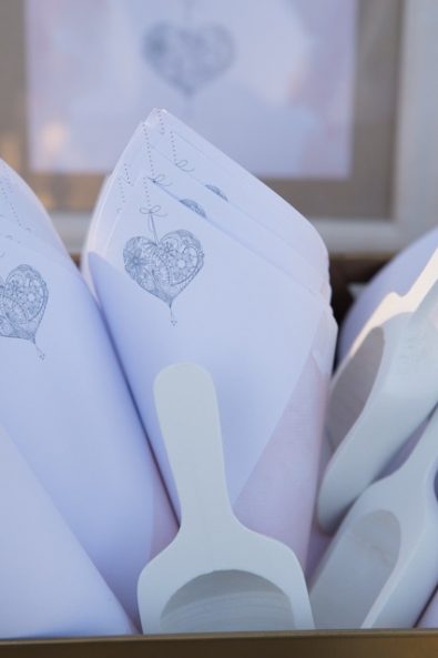 Custom made white party paper cones for sweets.