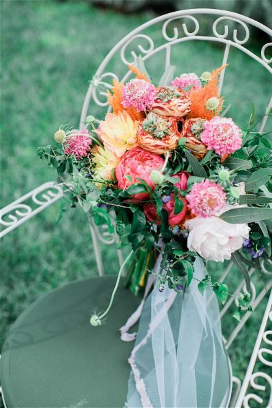 Wedding bouquet placed on chair
