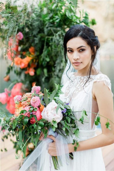 Bride with veil at Lake Vouliagment for her elopement in Greece