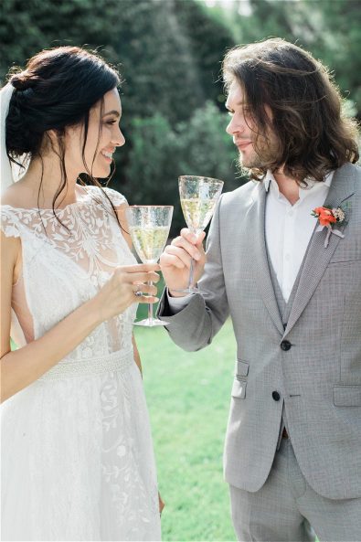Bride and Groom drinking champagne