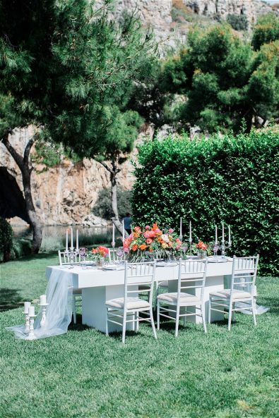 Table setup for lake elopement in Greece