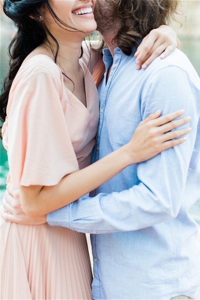 Groom holding bride