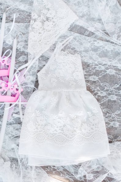Tiny baby girl's white lace baby christening dress.