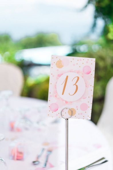 Custom made personalized printed table number card with rosegold and pink details.
