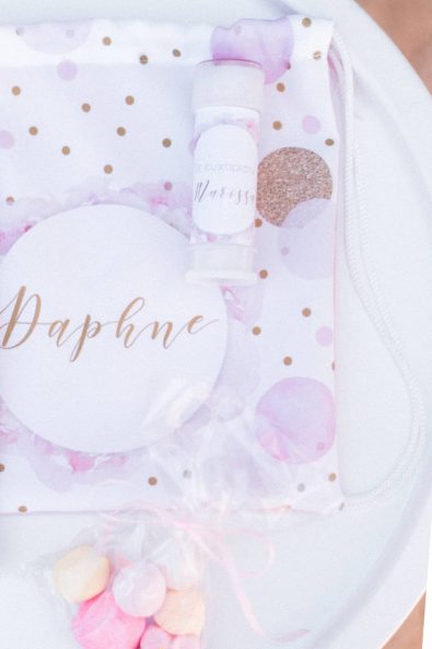 Personalized pouch bags with marshmallows and bubbles as children christening baptism favor Bomboniere.
