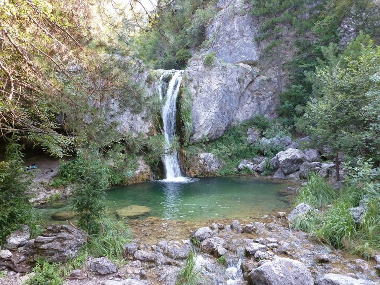 Mount olympus Greece small lake with waterfall