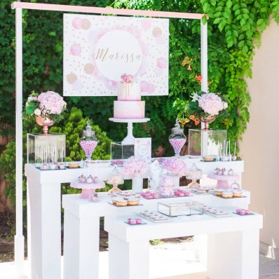 Pink, gold, rose gold and white candy bar dessert table for a destination christening.