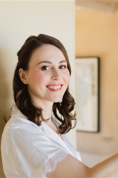 Bride smiling for camera