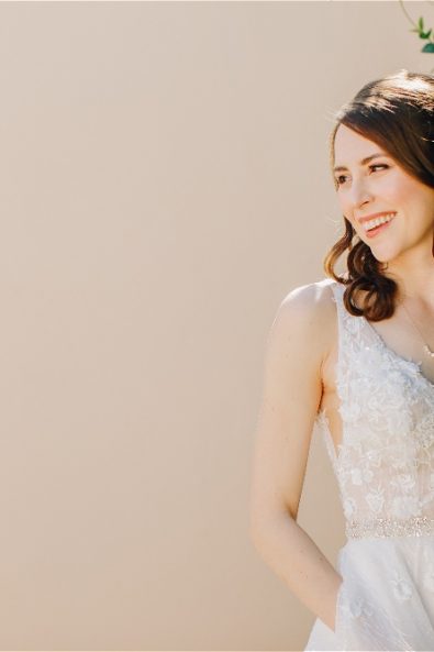 Bride laughing at her destination wedding in Athens Riviera