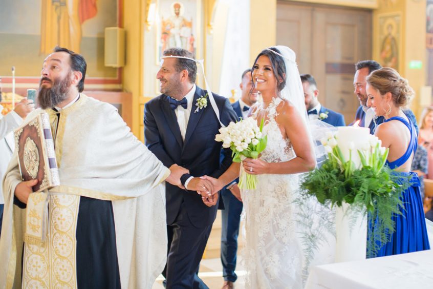 Greek wedding traditions bride and groom with stefana