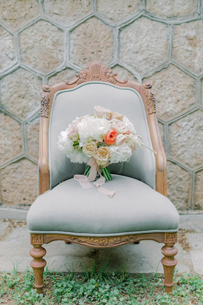 Bridal bouquet in light pink, light yellow and orange colors