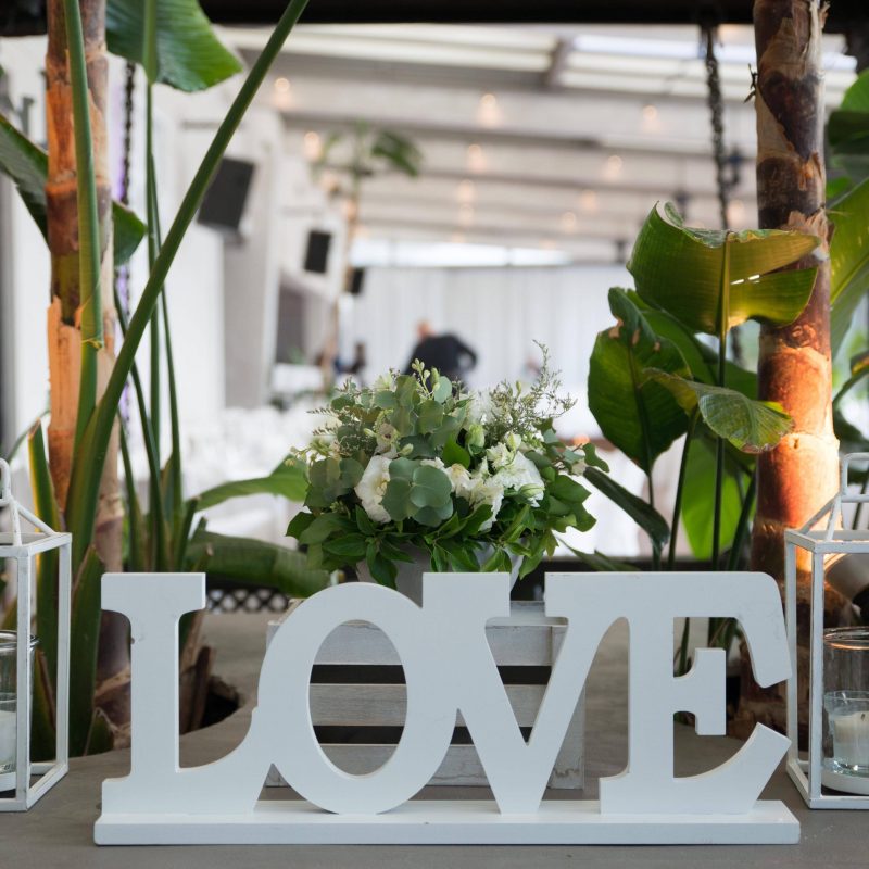 White Love decorative wooden sign with letters.