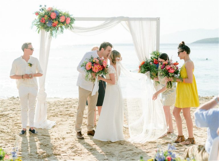 Couple getting married in Greece at a beach themed wedding