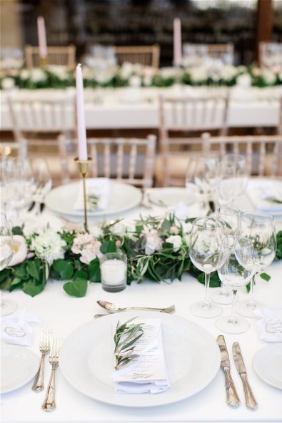 Dinnerware,. candles and flowers