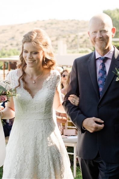 Bride and groom walking down aisle