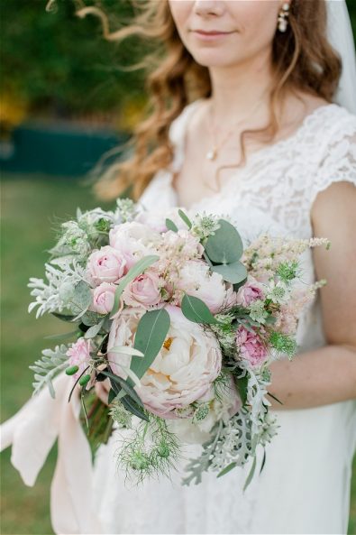 Bride holding wedding bouquet